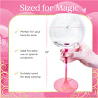 Wine glass with pink stem and base, held by a hand, on a pink background with text about its size and use.