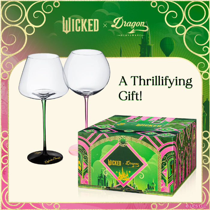 Wine glasses with a decorative box on a green and pink background, featuring 'Wicked x Dragon' branding.