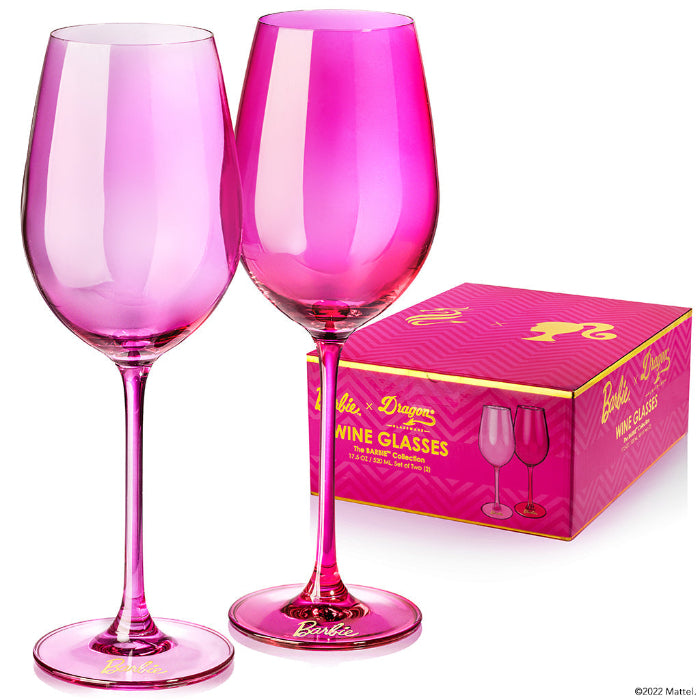 Set of two Barbie™ x Dragon Glassware® 17.5 oz stemmed wine glasses in pink and magenta with signature Barbie™ logos on the bases and coordinating pink gift box.