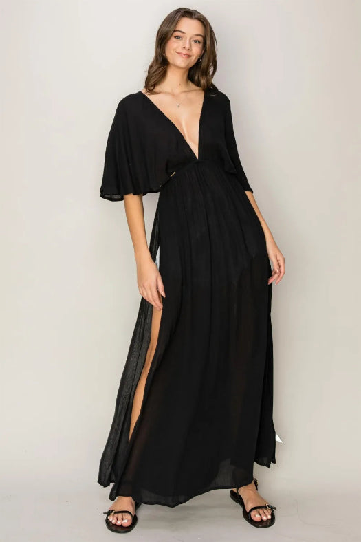 Woman wearing HYFVE Tie Back Maxi Split Cover Up Dress with plunging neckline and side slit maxi skirt