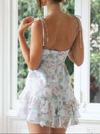 High School Sweetheart Mini Dress featuring a flattering sweetheart neckline, feminine tiered skirt, back zipper closure, and lightweight fabric, perfect for weddings, bridal showers, vacations, and spring or summer occasions. Color is Light Blue