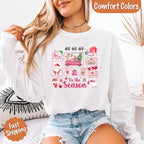 Comfort Colors Ho Ho Ho ’Tis The Season long sleeve Christmas shirt featuring a festive holiday graphic on a relaxed garment-dyed 100% cotton tee in Ivory