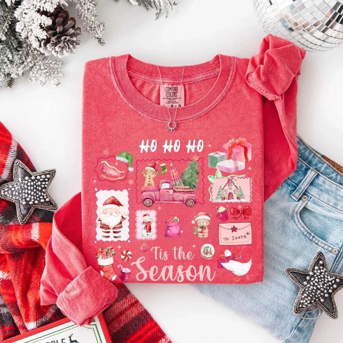 Comfort Colors Ho Ho Ho ’Tis The Season long sleeve Christmas shirt featuring a festive holiday graphic on a relaxed garment-dyed 100% cotton tee in Watermelon