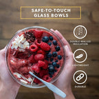 Set of two clear double wall glass cereal and soup bowls with a modern transparent design.