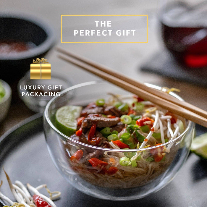 Set of two clear double wall glass cereal and soup bowls with a modern transparent design.
