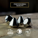 Set of four diamond-shaped stainless steel chilling stones by Dragon Glassware designed to cool whiskey and other beverages without melting or diluting drinks.