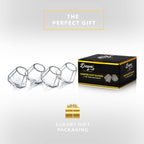 Set of clear diamond-shaped 2 oz shot glasses by Dragon Glassware featuring a unique geometric design that rests at a tilted angle.