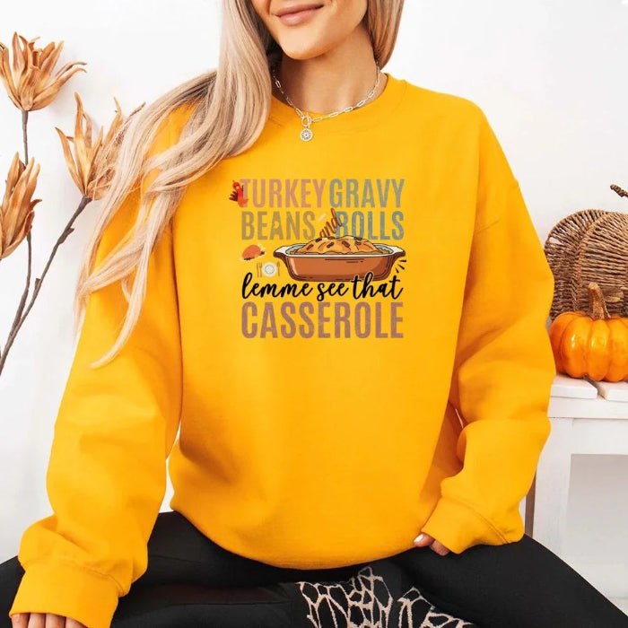 Turkey Gravy Beans & Rolls funny Thanksgiving crewneck sweatshirt featuring a holiday food-inspired graphic in a classic unisex fit in Gold