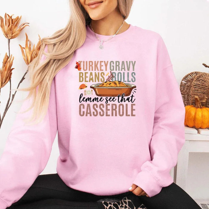 Turkey Gravy Beans & Rolls funny Thanksgiving crewneck sweatshirt featuring a holiday food-inspired graphic in a classic unisex fit in Light Pink