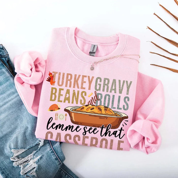 Turkey Gravy Beans & Rolls funny Thanksgiving crewneck sweatshirt featuring a holiday food-inspired graphic in a classic unisex fit in Light Pink