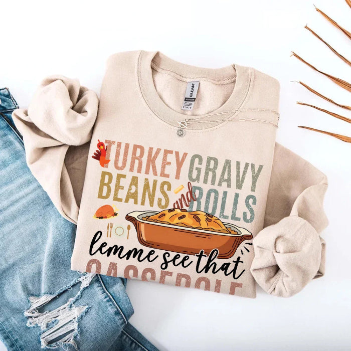 Turkey Gravy Beans & Rolls funny Thanksgiving crewneck sweatshirt featuring a holiday food-inspired graphic in a classic unisex fit in Sand