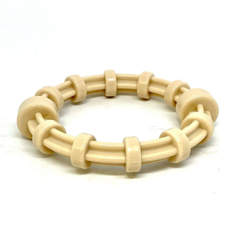 SodaPup Honey Bone chicken flavored nylon teething ring with textured ridges for puppies and power chewers up to 55 pounds.