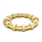 SodaPup Honey Bone chicken flavored nylon teething ring with textured ridges for puppies and power chewers up to 55 pounds.